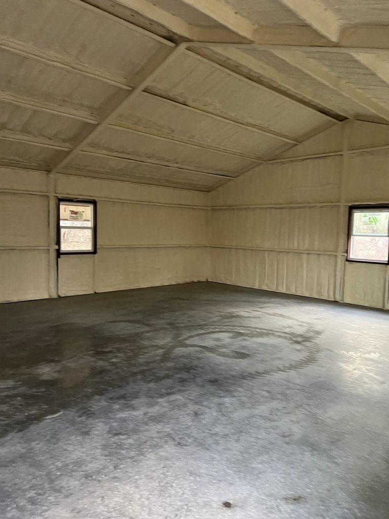 Finished metal shop interior with spray foam insulation