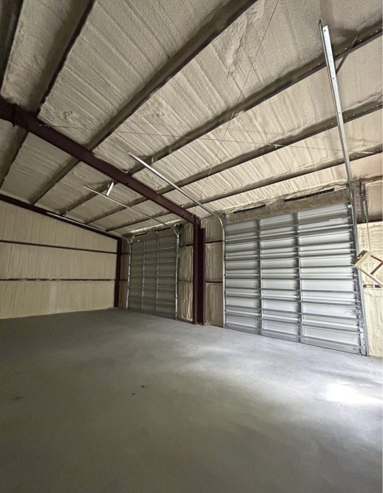 Shop with overhead doors and spray foam insulated walls and roof