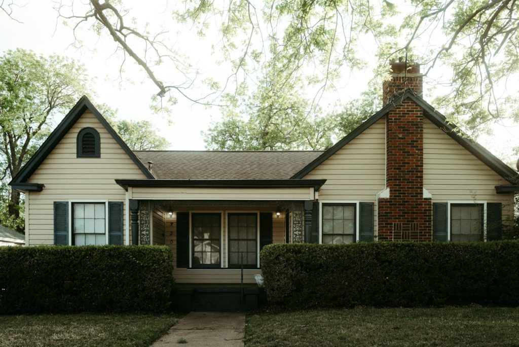 Brick home with a chimney in a Texas neighborhood